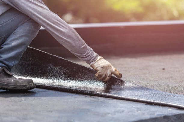 Professional Waterproofing technician working in Summitville, IN